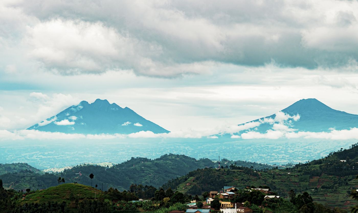 Volcanoes rising above clouds